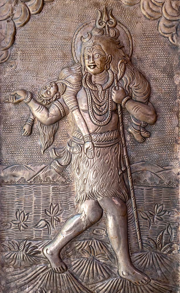 Sculpture of Shiva carrying body of Shakti at Jwaladevi Temple